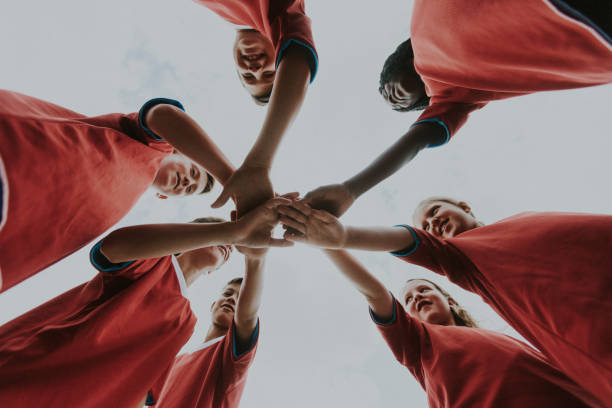 istock Young soccer players in a motivational huddle 2151963138
