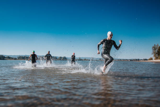 istock Male athlete competing in triathlon 2151963363
