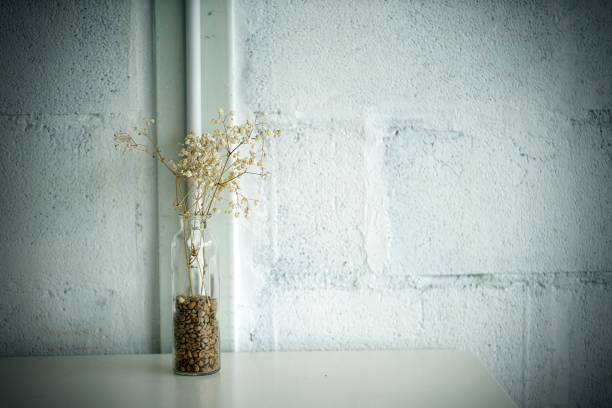 istock Vase with dried flower on table 2151963466