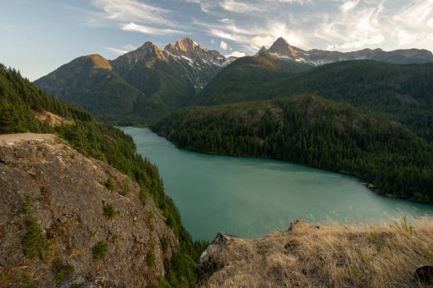 istock Grass Covered Cliffs Make A Steep Drop Down to Diablo Lake Below And The North Cascades In The Distance 2151963694