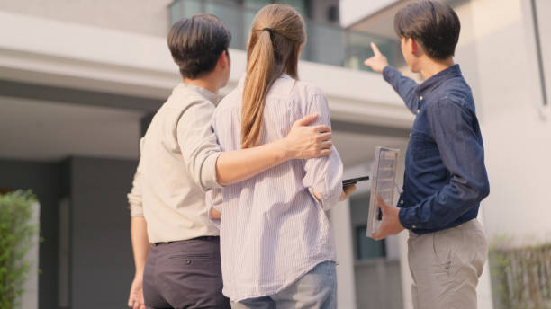 istock Consultant Showing Best Solar Panel Positioning to Homeowners. 2151964460