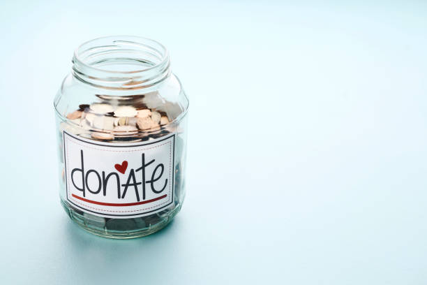 American currency in a donation jar