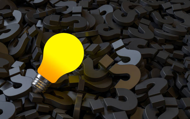 istock One Glowing Idea Light Bulb Shining Among the Question Marks on Dark Background. 3d Rendering 2151969073