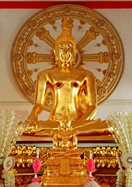 istock Golden Buddha Statues in Wat Dhamma Rangsri Temple. 2151973102
