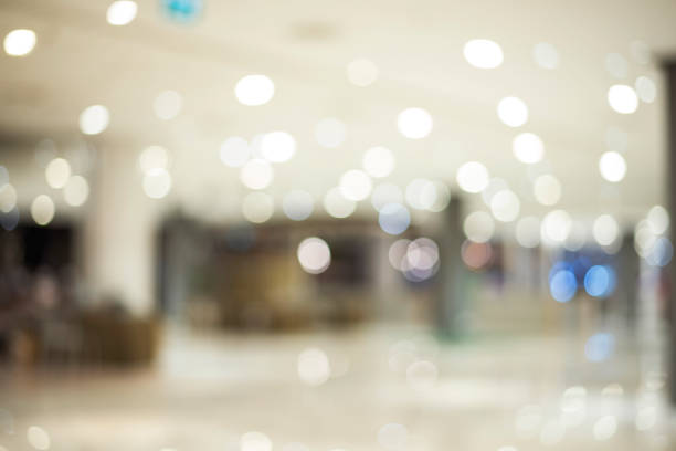 istock Blurred background bright shopping mall Silver gray lighting. defocused store light bokeh in retail store. Blurry hospital bright softness hotel with copy space. Backdrop present design template. 2151973748