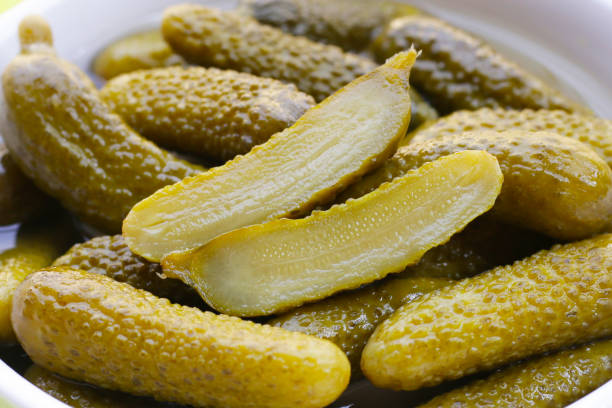 istock Tasty pickled cucumbers. Fermented vegetables 2151973783