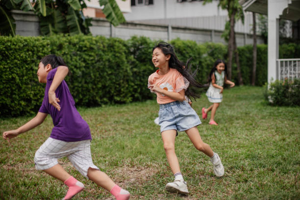 istock Children excitedly running in the yard 2151975369