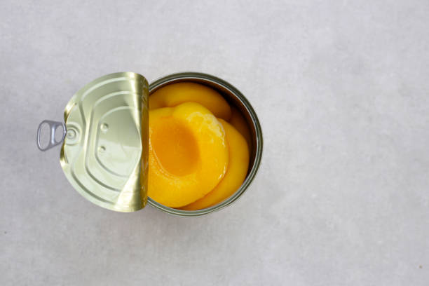 istock Peach halves in syrup. Fruity desserts 2151976112