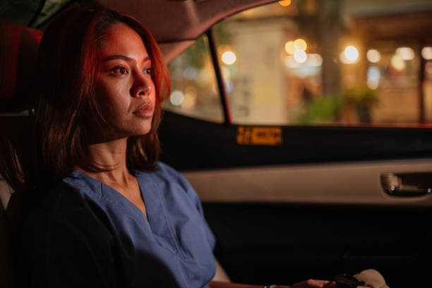 istock Nurse returns home by taxi 2151976210