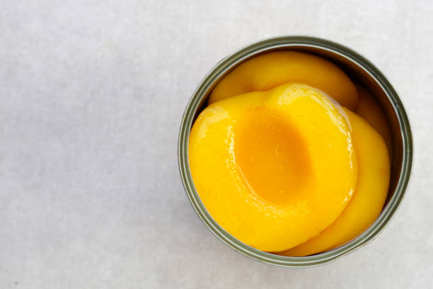 istock Peach halves in syrup. Fruity desserts 2151976264