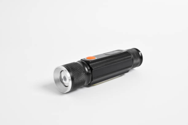 istock Modern metal LED flashlight in black color 2151982329