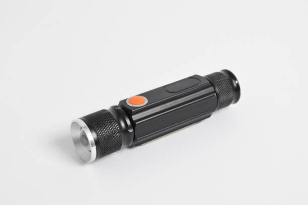 istock Modern metal LED flashlight in black color 2151982338