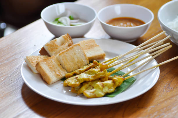 pork satay with toast and sauce, satay