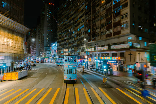 Double-decker tram in Hong Kong  at night  in blurreed motion