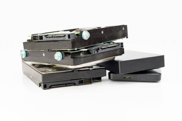 istock A number of external and internal hard disk drives isolated on white backgroun 2151984058