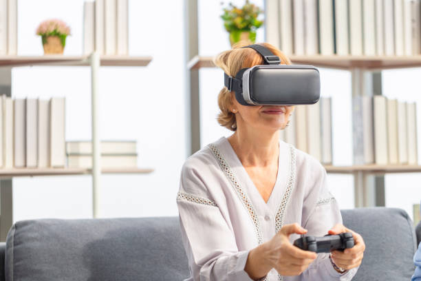 istock Caucasian woman playing video game using virtual reality glasses and joystick 2151984191
