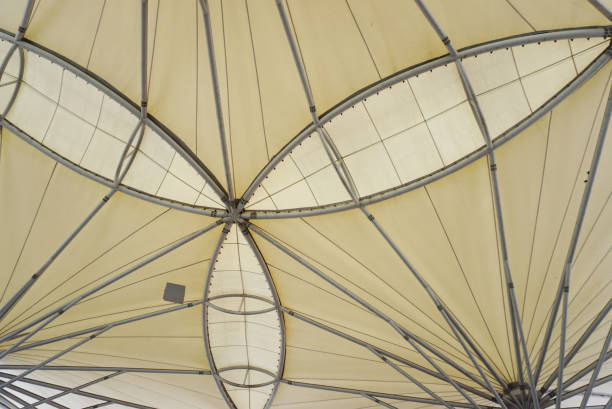 istock Architecture background, Fabric roof and metal structure with Low angle view 2151984335