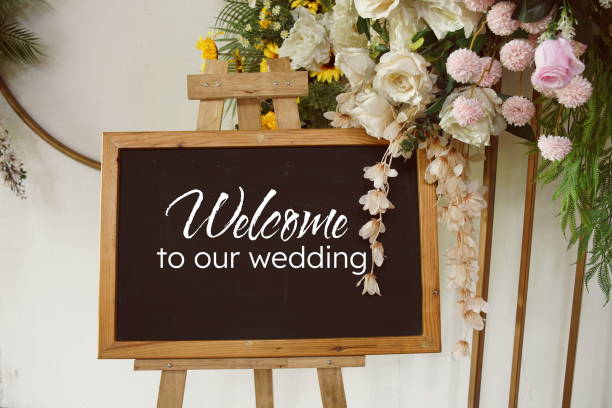 istock Wedding welcome board wooden frame with flowers decoration 2151986227
