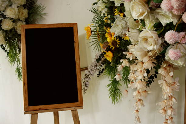 istock Wedding welcome board wooden frame with flowers decoration 2151986245