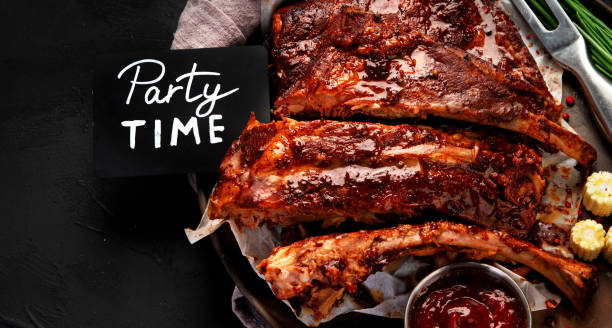 istock Grilled and smoked ribs with barbeque sauce. 2151986640