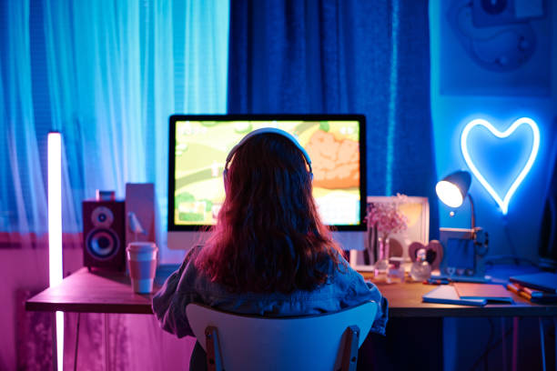 Unrecognizable Girl Playing Gamer On Computer