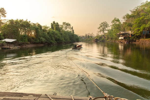 A boat floats on the River Kwai in Thailand.
