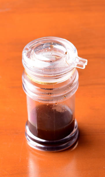 istock Sauce bottle on wooden table 2151989230