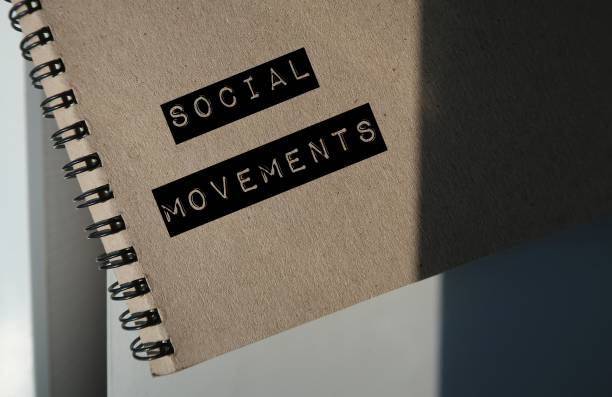 istock Notebook with text written SOCIAL MOVEMENTS - people or organization grouping which focus on political or social issues 2151990068