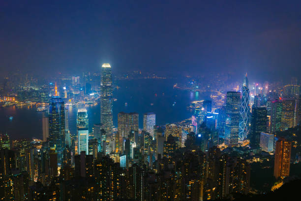 Scenic view of neon  lit Hong Kong cityscape at night from Victoria Hill