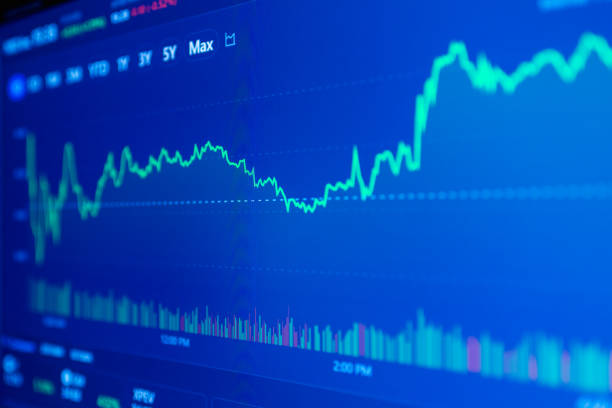 Stock market upwards chart on the screen. Selective focus.Low angle.