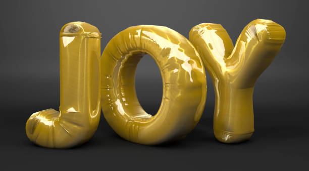 Gold JOY balloons standing on black background. / You can see the animation movie of this image from my iStock video portfolio. Video number: 2150814961