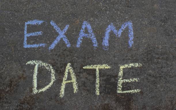 istock Exam Date Phrase Written Blackboard with Chalk, Study or Education Concepts 2151993807