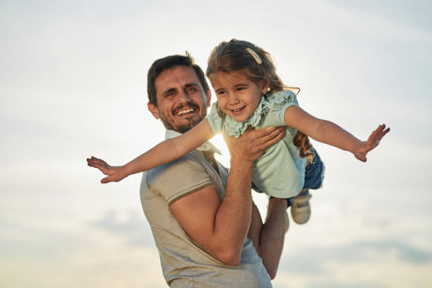 istock Father and daughter enjoying nature 2151996529