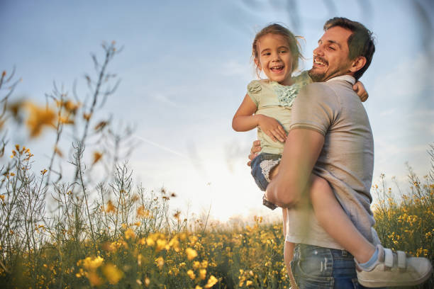 istock Father and daughter enjoying nature 2151996783