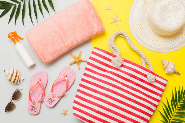 istock Composition with stylish beach accessories on colored background, top view. Beach fashion flat lay, summer concept. Trendy colors 2151998783