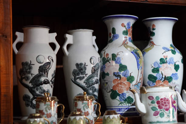 antique four large vases placed on a wooden shelf background, object,decor, gift, ancient, copy space