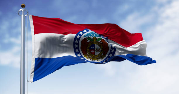 istock Missouri state flag waving on a clear day 2152001621