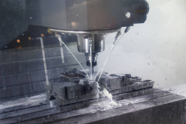 istock Auto CNC turning with robot drill milling factory with water coolant streams 2152002562