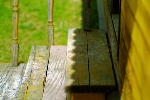istock Old steps on the stairs to a rural house 2152004865