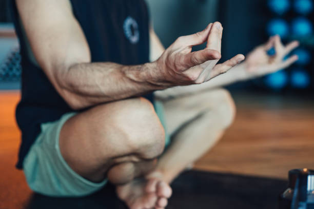 istock Young man meditating in Lotus position. 2152006872