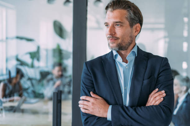 istock Confident businessman and his team. 2152007793