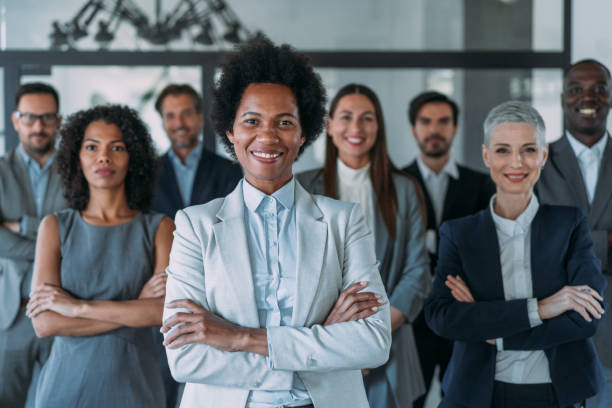 istock Confident businesswoman and her team. 2152007794