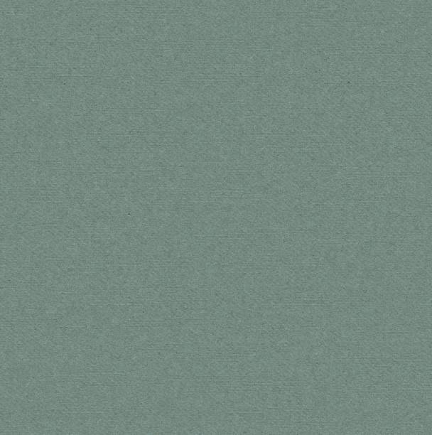 istock Dark green rough background with textured surface close-up from above 2152010197