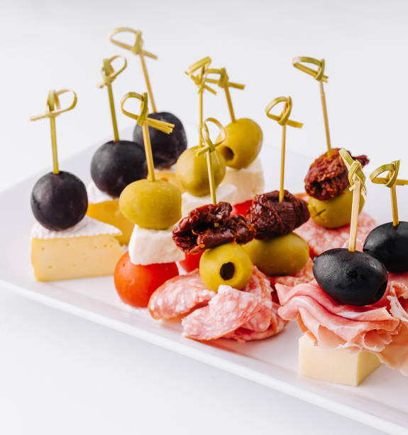 istock Gourmet appetizer selection on a white platter against a clean backdrop 2152021342