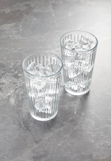 istock Two Glasees Of Ice On Table 2152023356