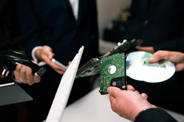 istock Business people holding electronic waste on isolated background. Quaint 2152023990