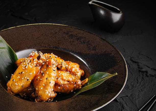 istock Gourmet teriyaki chicken dish on elegant plate 2152024612