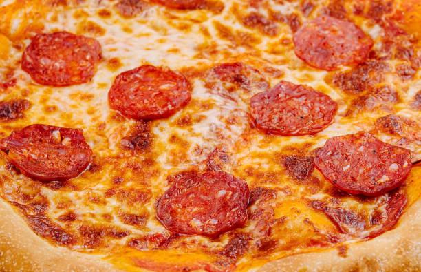 istock Freshly baked pepperoni pizza close up 2152024879