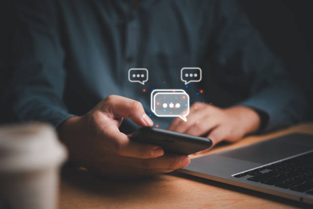 istock Business professionals using smartphone display chatting conversation concept of modern communication. Social media marketing technology 2152025563