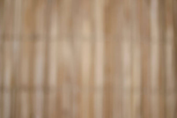 unfocused pattern wood - braided straw fence, natural and aesthetic, sustainable craft texture - background